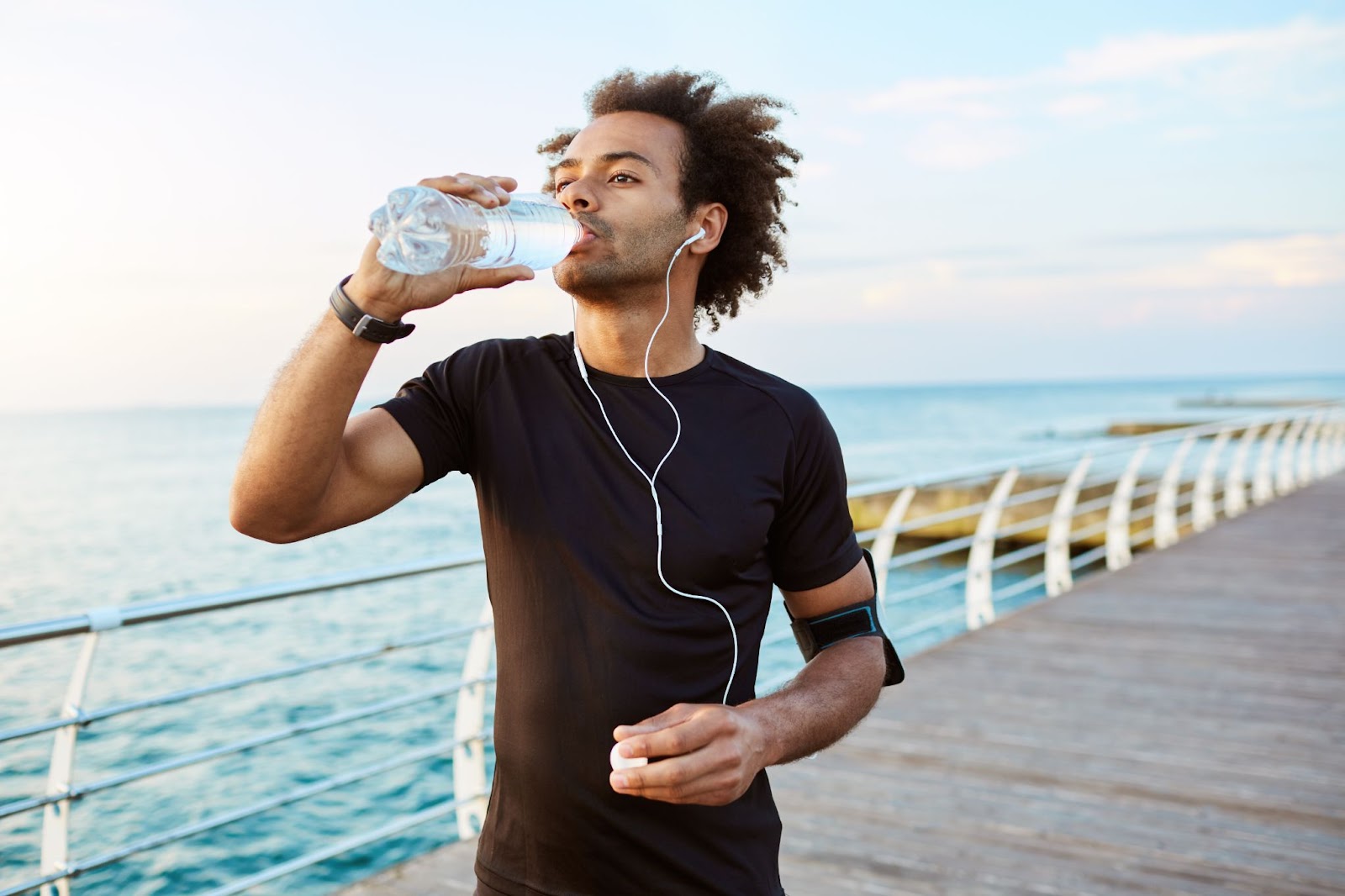 Runner taking a break and drinking water