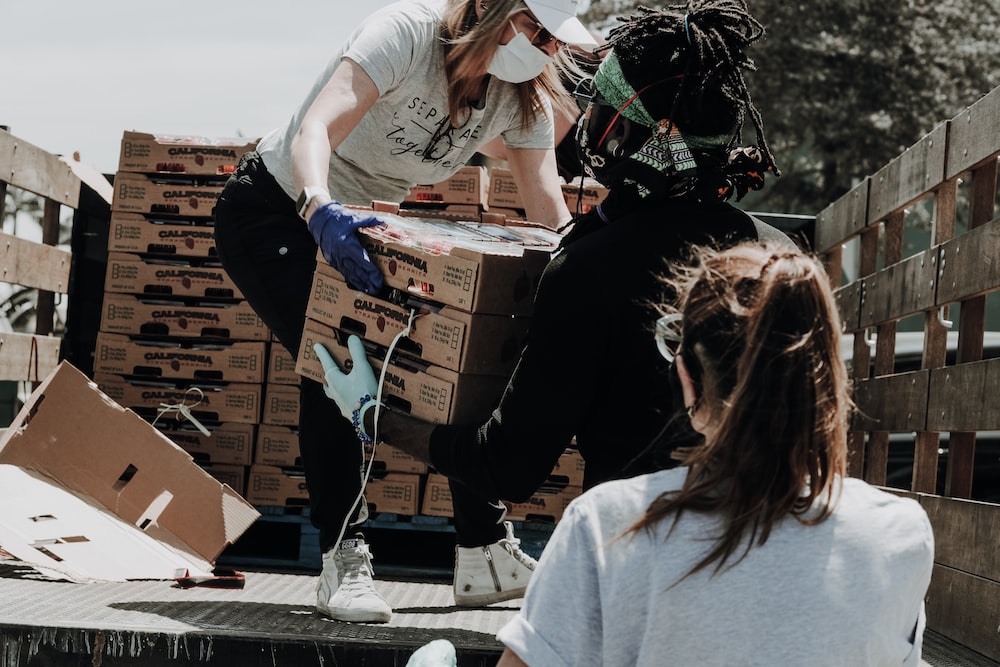 unloading a car of boxes