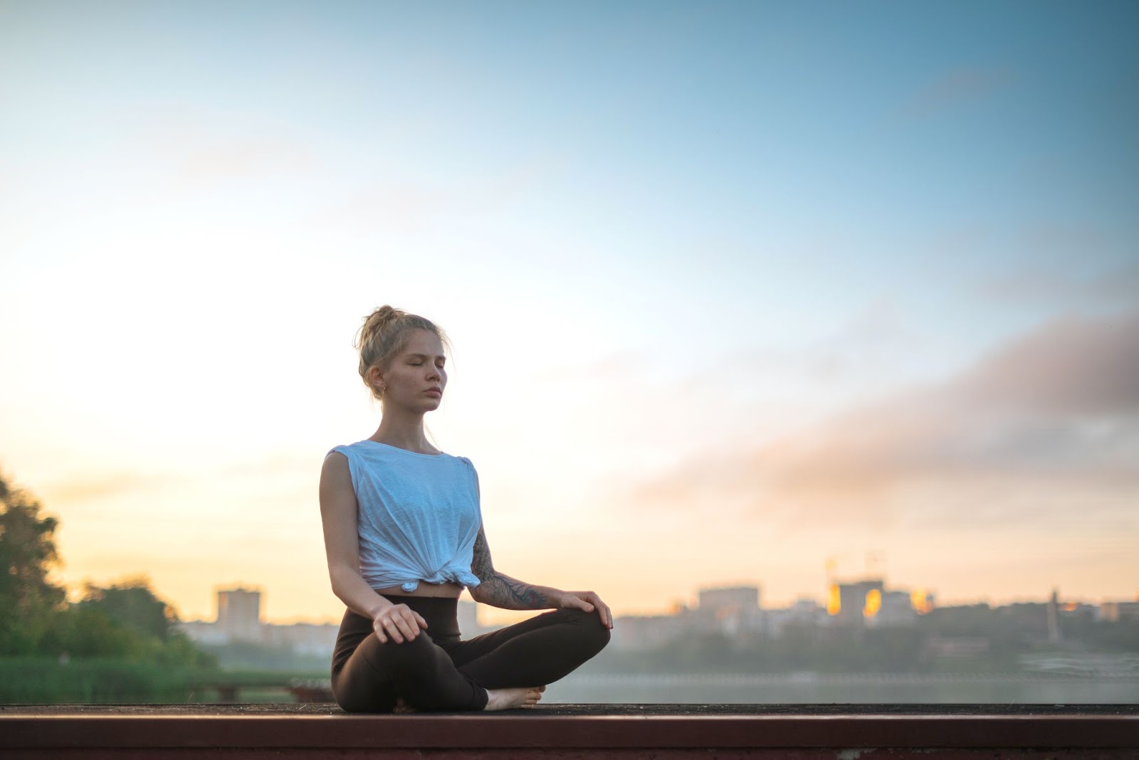 Woman doing yoga early in the morning