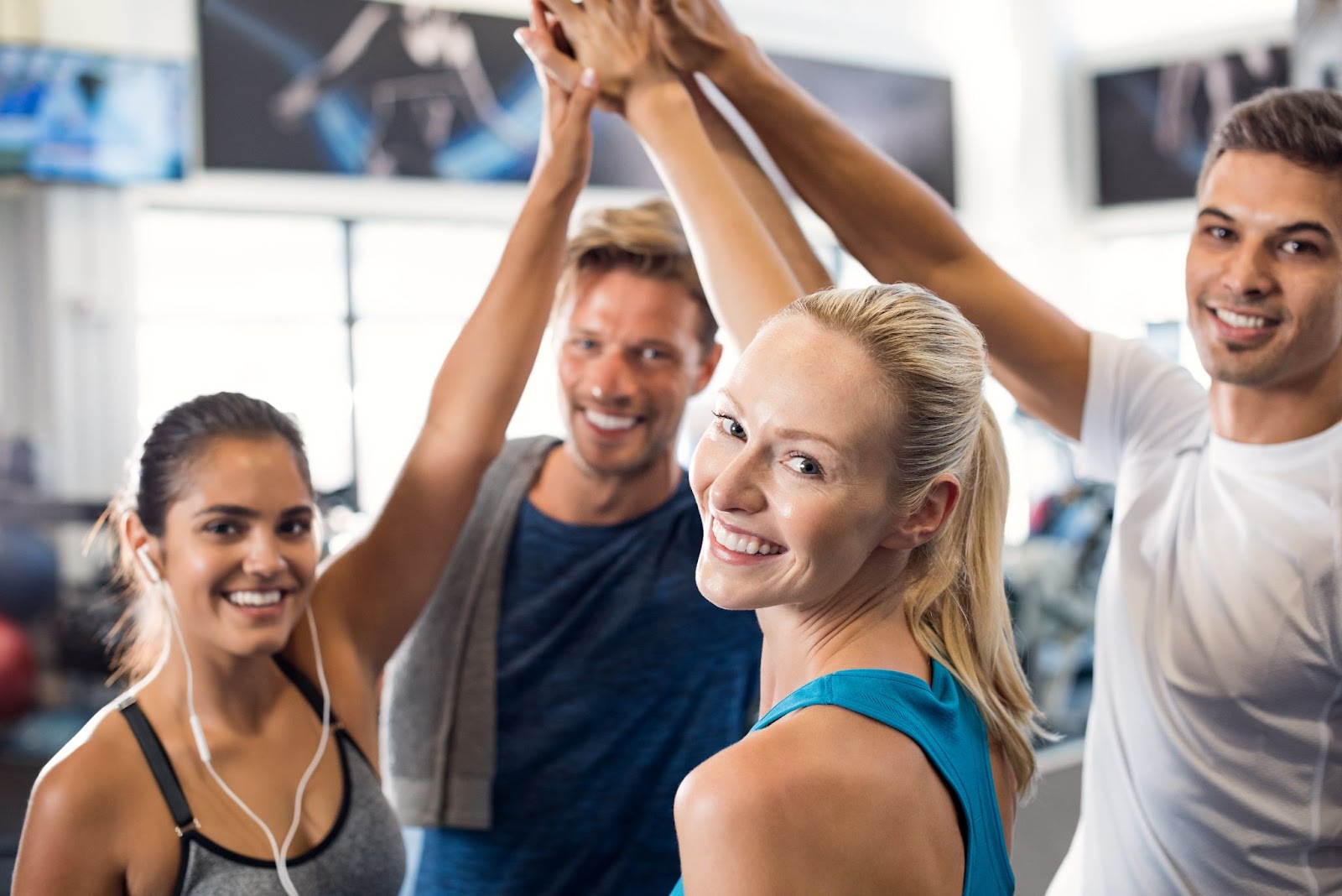 Happy gym class, giving each other a high five