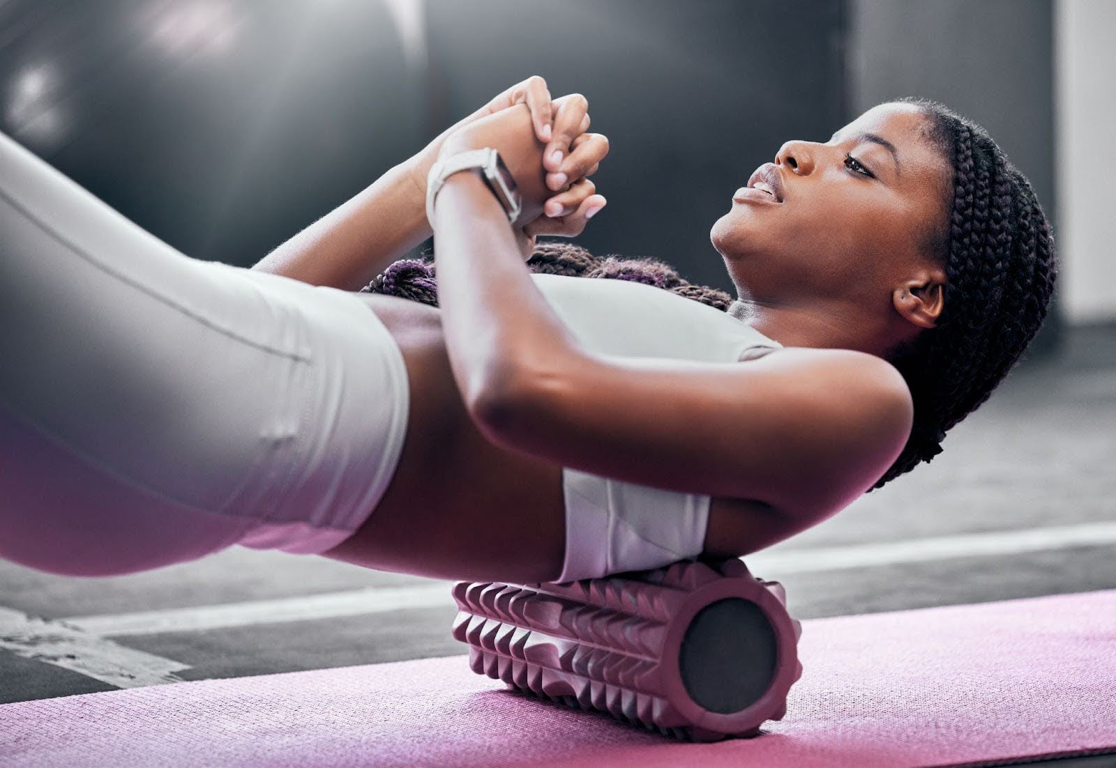 Fit woman doing a Contemporary Pilates class